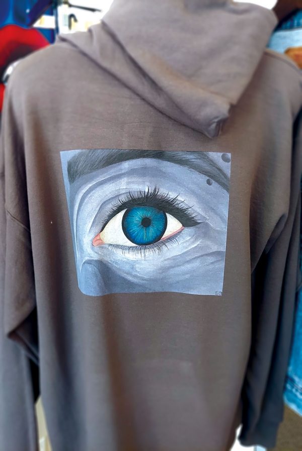 Stephanie George "Gaze" piece on a grey hoodie