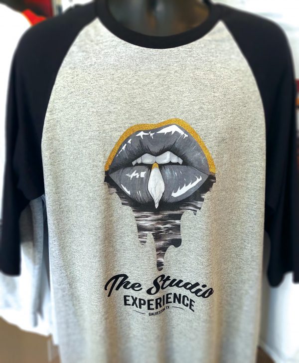 Stephanie George Golden J piece on a sweatshirt