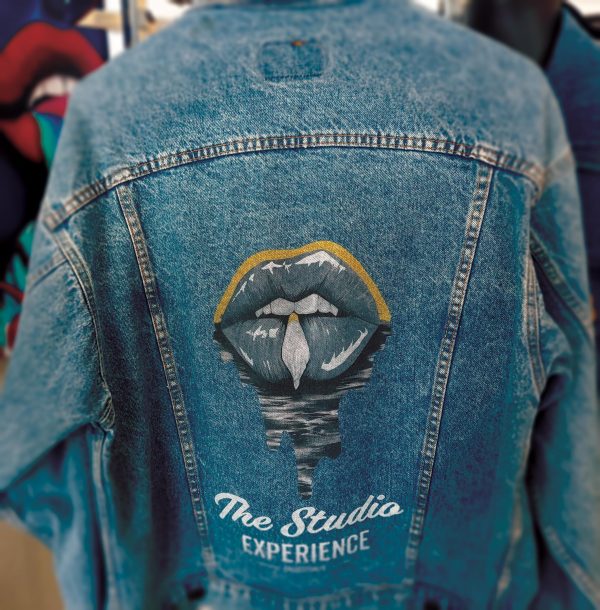 Stephanie George Golden J piece on a jean jacket