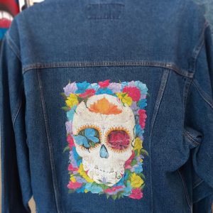 Stephanie George Sugar Skull piece on a jean jacket