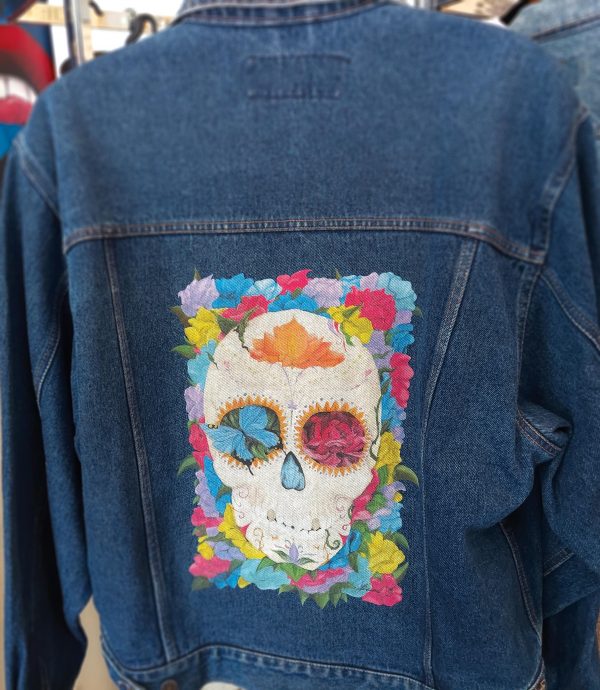 Stephanie George Sugar Skull piece on a jean jacket