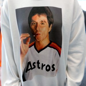 Scarface in a Astros jersey on a white sweatshirt